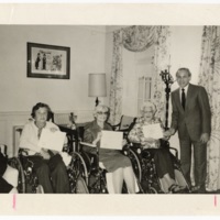 Rabbi Arnold Task with Flossie Bluenenstein and two women