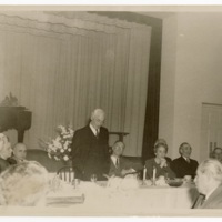 Rabbi Joseph Asher speaks at meal