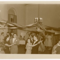 Group of students dancing in social hall